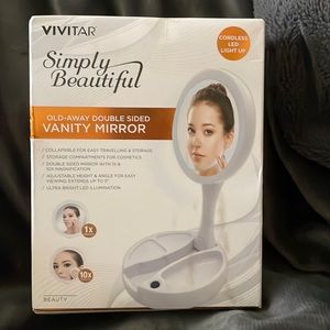 Brand new Vivitar vanity mirror, double sided collapsible